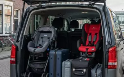 Kun je een taxi reserveren naar Rotterdam Airport met bagage en kinderzitje?